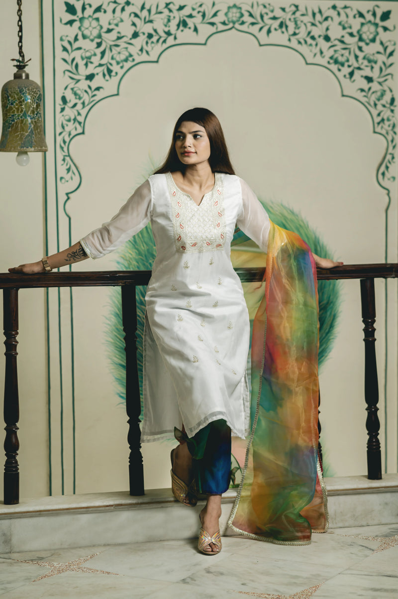 traditional white embroidered kurta with rainbow dupatta
