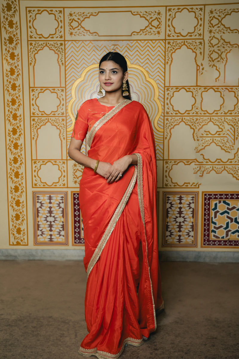 elegant ethnic orange saree drape look
