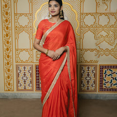 elegant ethnic orange saree drape look
