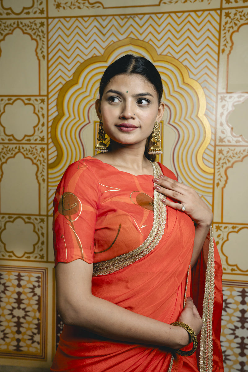 festive orange saree for wedding function
