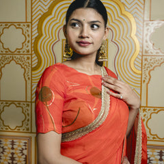 festive orange saree for wedding function
