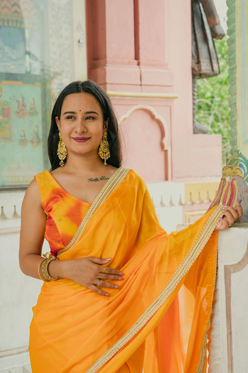Bright yellow party wear saree
