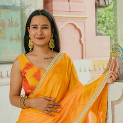 Bright yellow party wear saree
