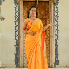 Women wearing yellow chinnon saree