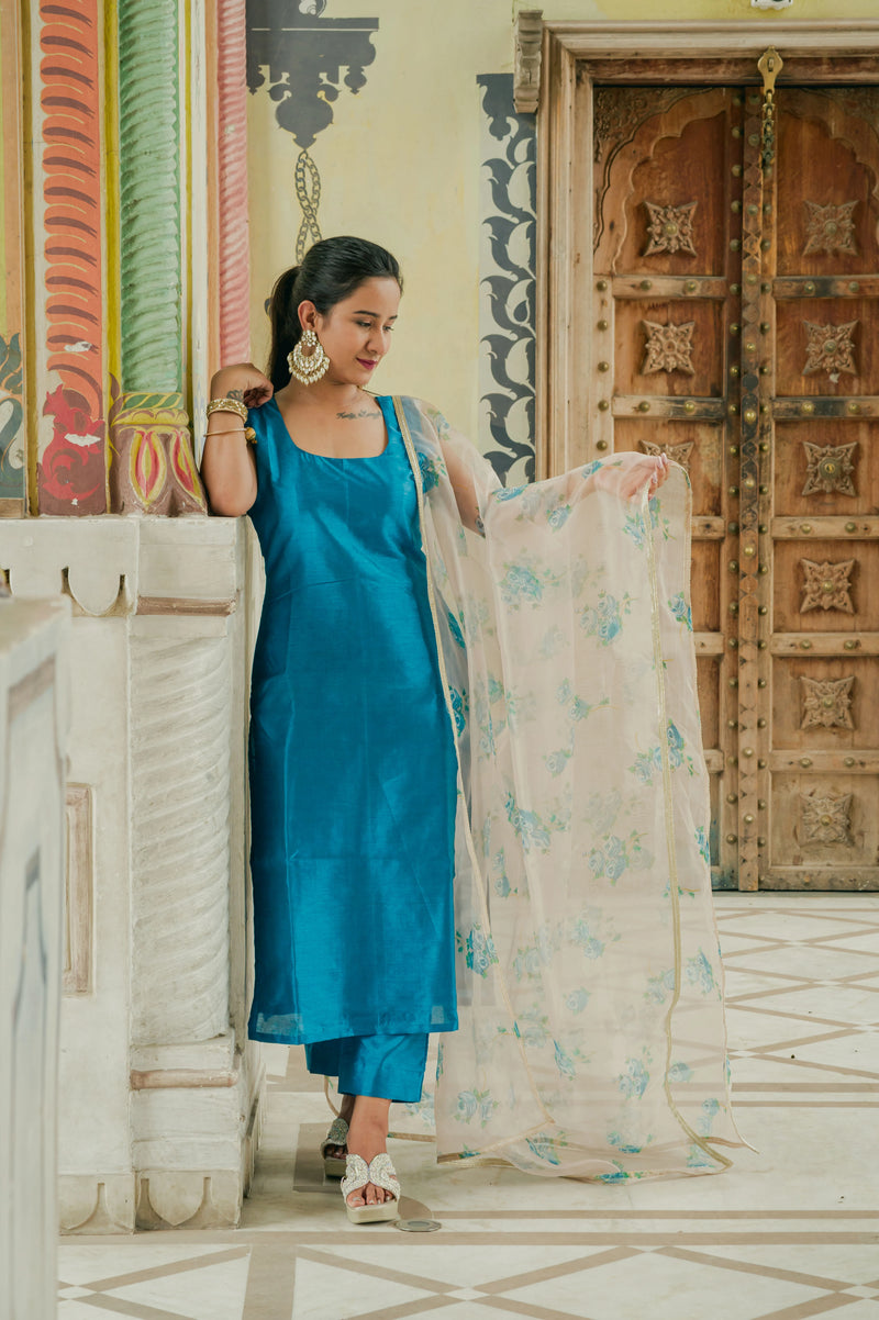 Women wearing blue silk traditional outfit
