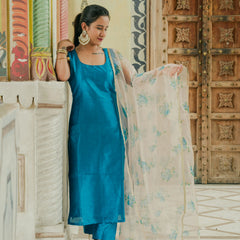 Women wearing blue silk traditional outfit
