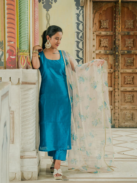 Women wearing blue silk traditional outfit
