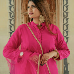 Women wearing pink party wear suit set
