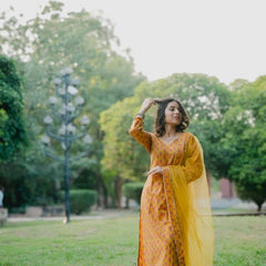 Yellow cotton suit set with net dupatta
