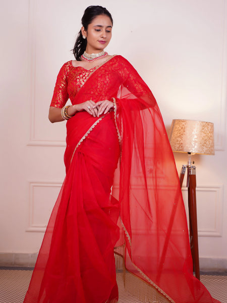Designer red saree with latkan pallu
